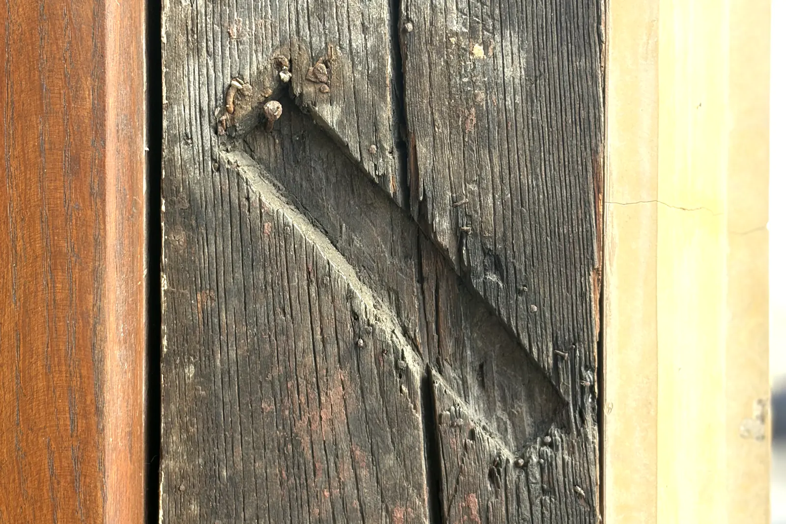 An indentation left by a mezuzah in a door frame on Józefa St. in Kazimierz, Kraków
