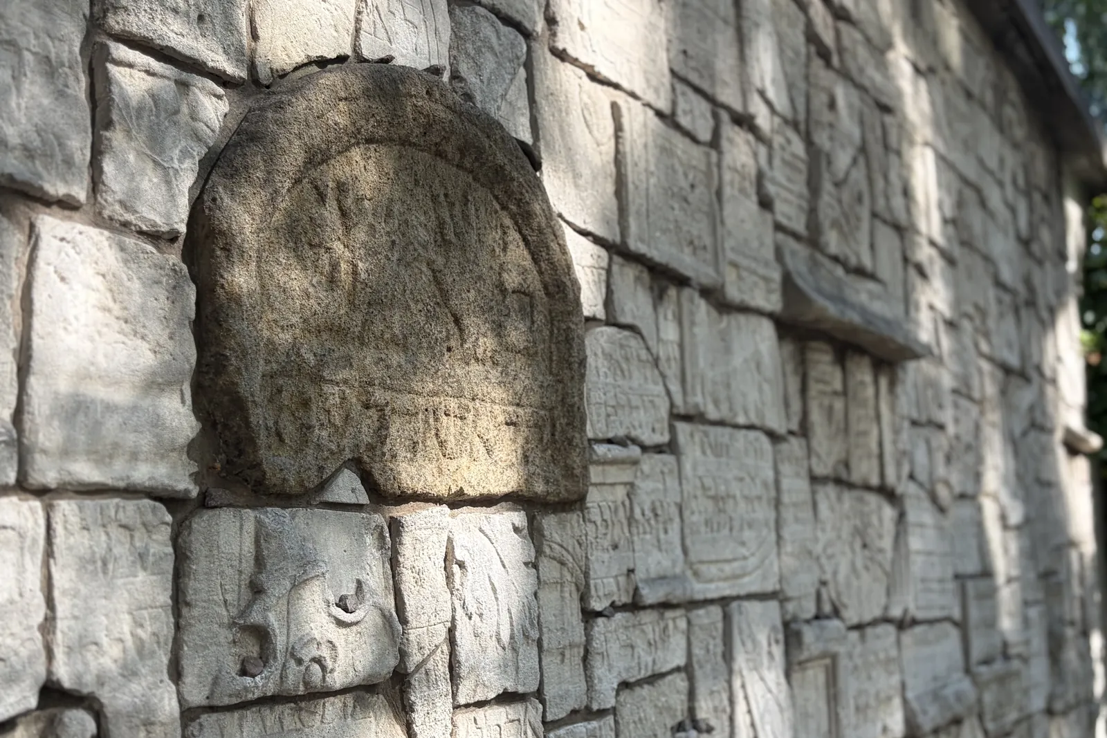 A wall with embedded fragments of matzevot discovered in 1956 at the Remah Cemetery in Kazimierz