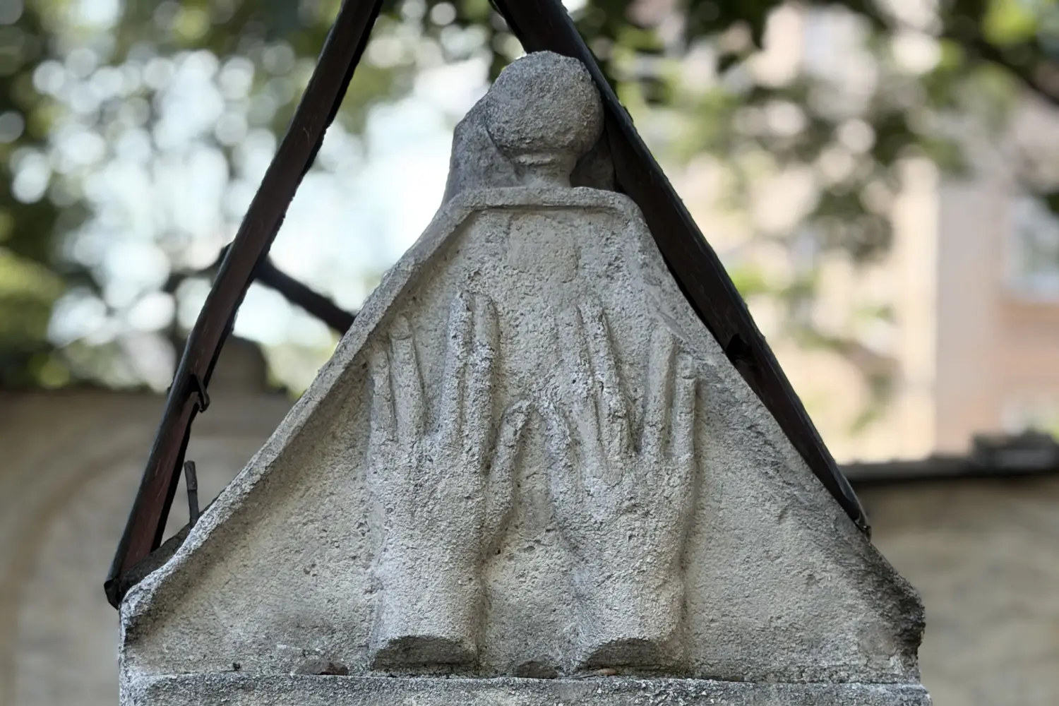 The symbol of the kohen's hands (the priestly blessing) carved on a matzevah at the Remah Cemetery in Kazimierz