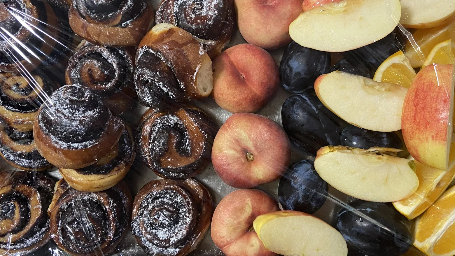 Kosher baked goods and fruit prepared for a group meal
